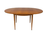 Round Scandinavian Teak Dining Table with Butterfly Leaf